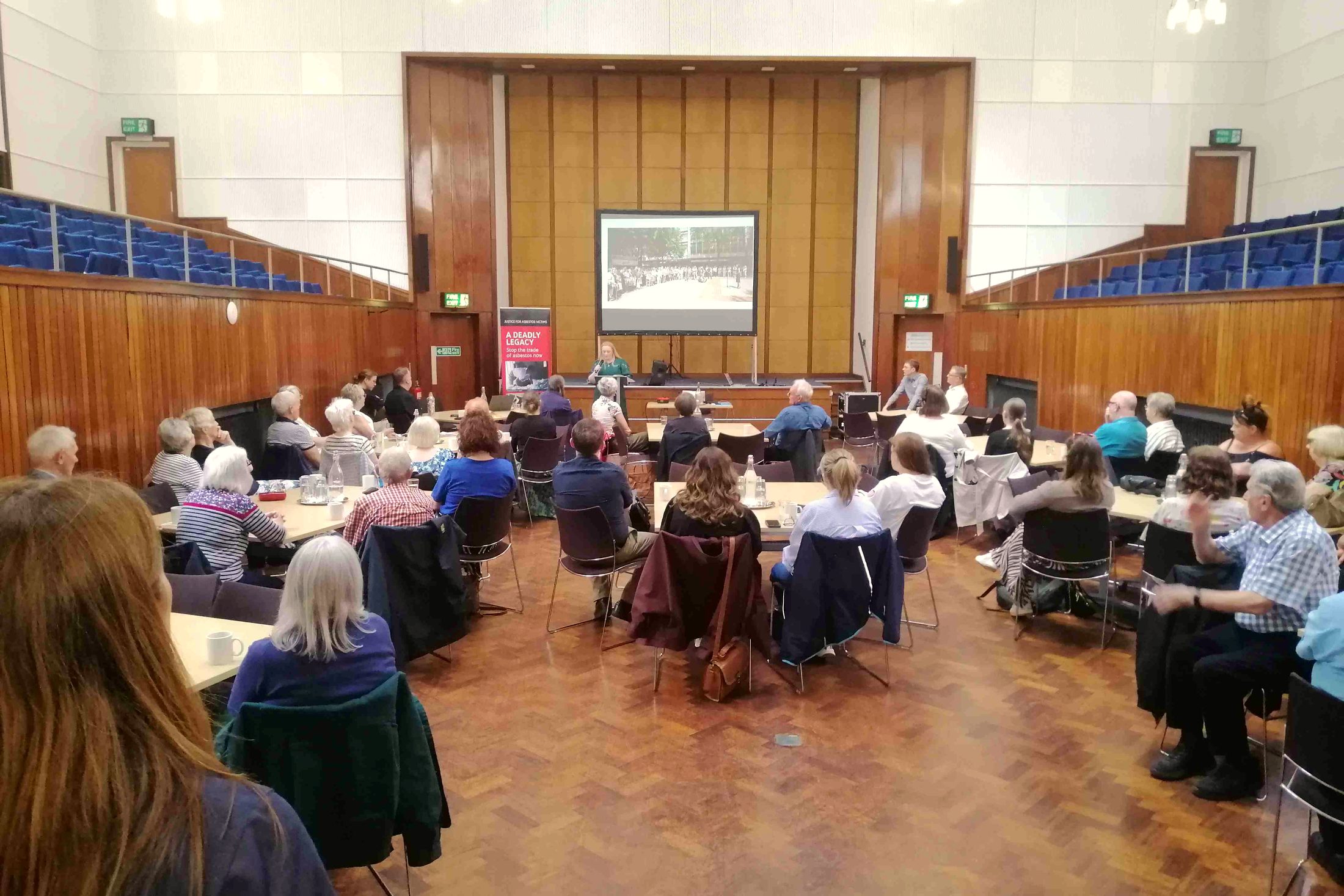 Campaigners listening to a talk at Action Mesothelioma Day 2026